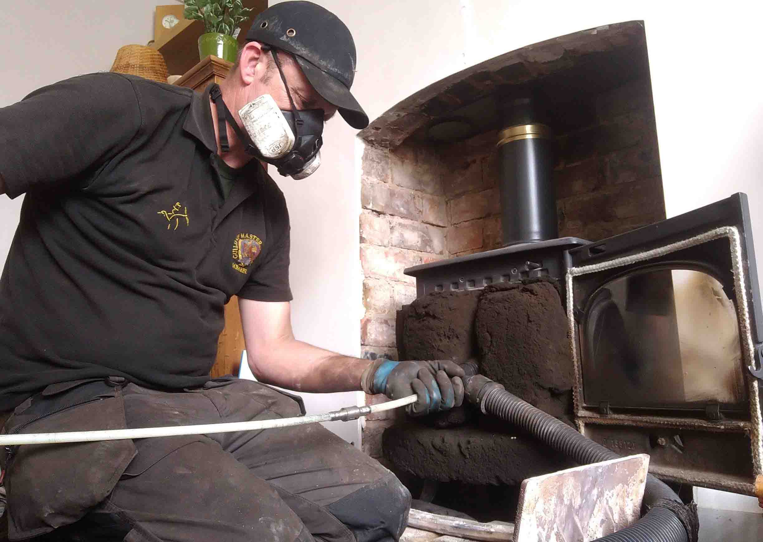 A Chimney Sweep stove cleaning hoover